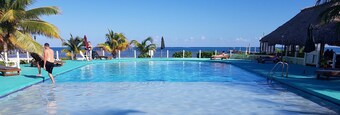 Stay in an upgraded comfortable Sea view Cabana suite just feet from the water