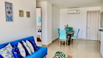 Basic Apartment | Living room | 32-inch flat-screen TV with cable channels, TV