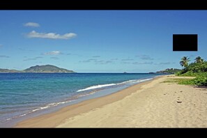 On the beach, sun-loungers, beach towels