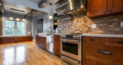 Modern home in historic neighborhood with lower level game room!