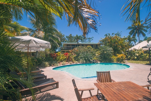 View of Villa Ta'i, from across the pool, top floor of the colonial style house