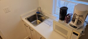 Fridge, microwave, dishwasher, coffee/tea maker