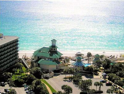 FREE GOLF CART! Stocked Lake with amazing views! 5 Mins. To Beach & pool