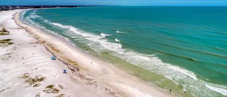 On the beach, sun-loungers, beach towels
