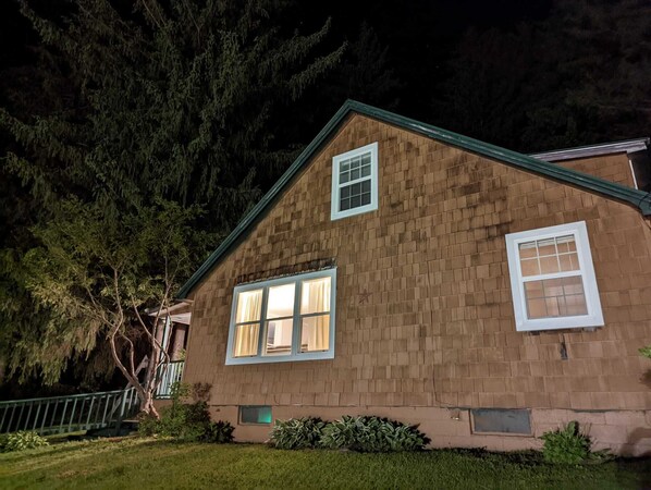 A two-story house with a brick exterior and a green roof. - Charming, Pet Friendly, Lake View Home. Pontoon and/or Slip Available (Cuba)