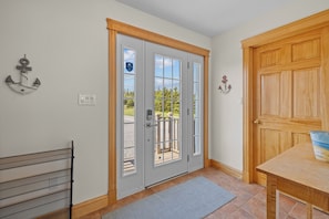 Enter a welcoming space with a double door and ample storage.
