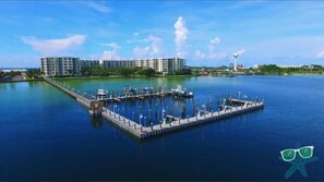 Stunning waterfront marina with docks extending into the calm water.