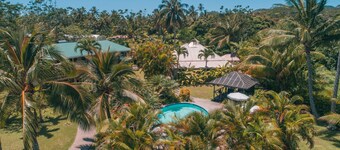 Villa RUA lower floor of colonial style villa set in tropical gardens with pool