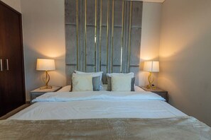 1 dormitorio, tabla de planchar con plancha, cuna de viaje y wifi