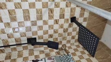 Combined shower/tub, hair dryer, towels, soap