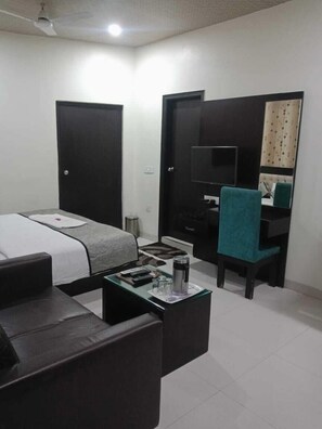 Quarto casal executivo, 1 quarto, vista para a cidade | Roupas de cama premium, edredons de pluma, frigobar