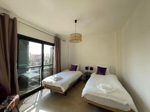 2 dormitorios, tabla de planchar con plancha, wifi gratis y ropa de cama