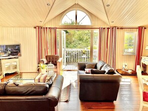 Ferienhütte, Mehrere Betten | Wohnzimmer | Kamin