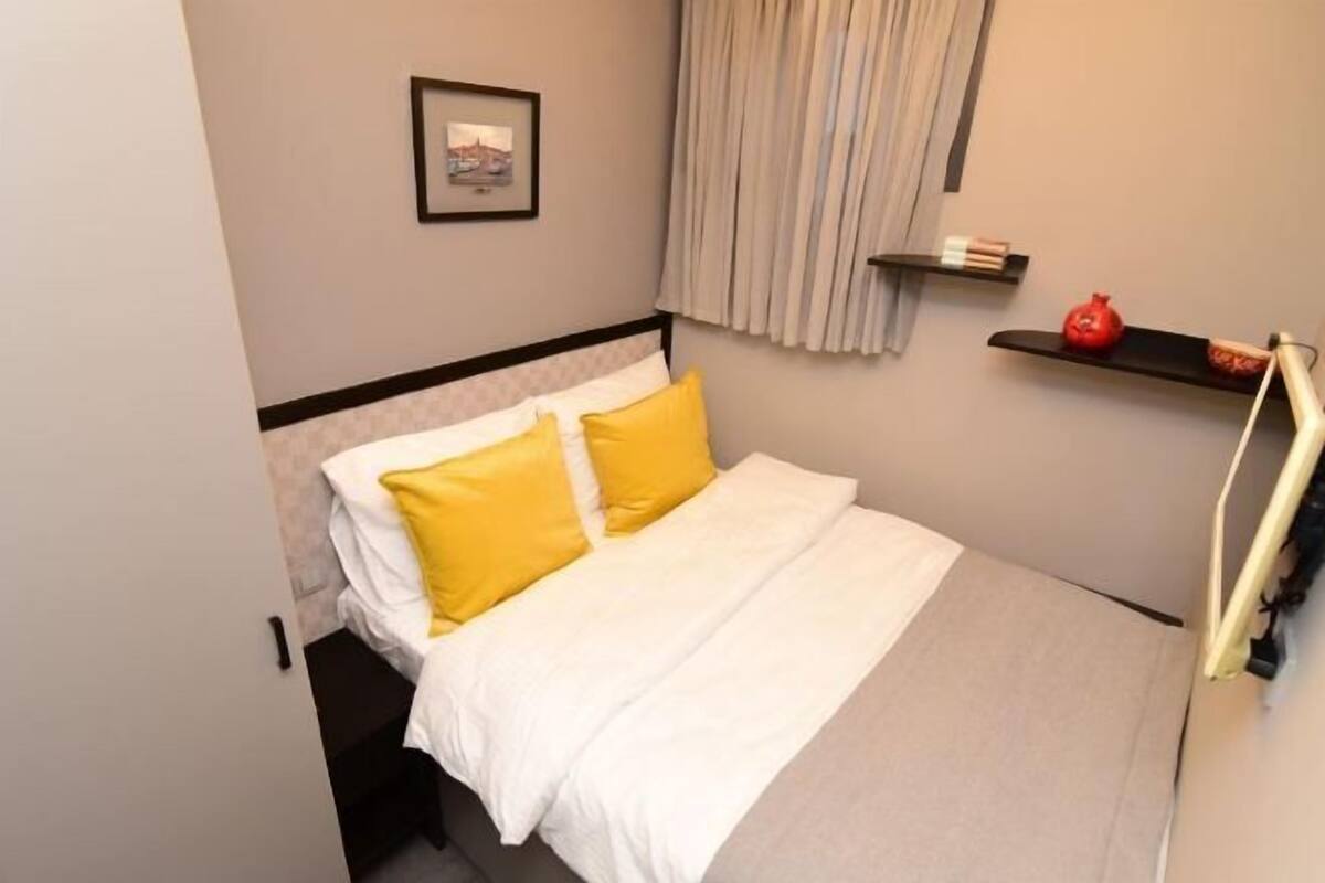 Egyptian cotton sheets, premium bedding, down duvets, minibar