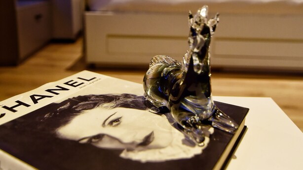 A room with a bed, a bedside table, and a decorative item on the table. - The Row Taksim Hotel (Istanbul)