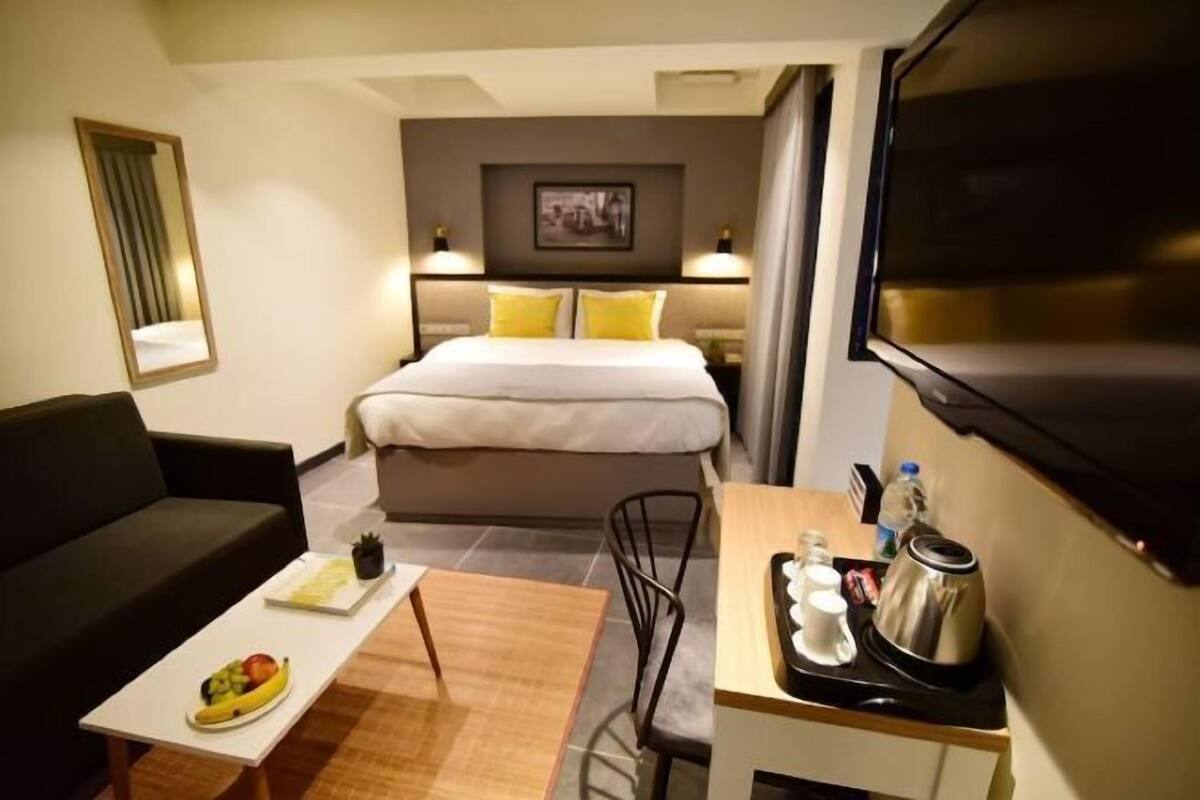 Egyptian cotton sheets, premium bedding, down duvets, minibar