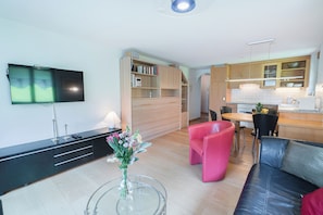 Condo de base | Aire de séjour | Planchers chauffants, bureau
