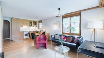 One-Bedroom Apartment with Matterhorn View | Living area | Heated floors, offices