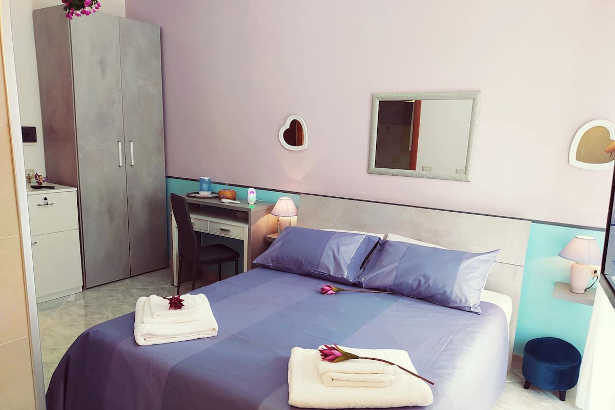 Honeymoon Double Room | Down duvets, memory-foam beds, in-room safe, individually decorated