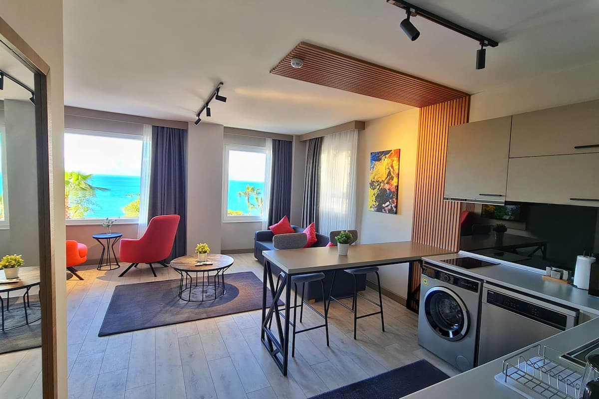 Suite Supérieure, vue partielle sur la mer | Cuisine privée