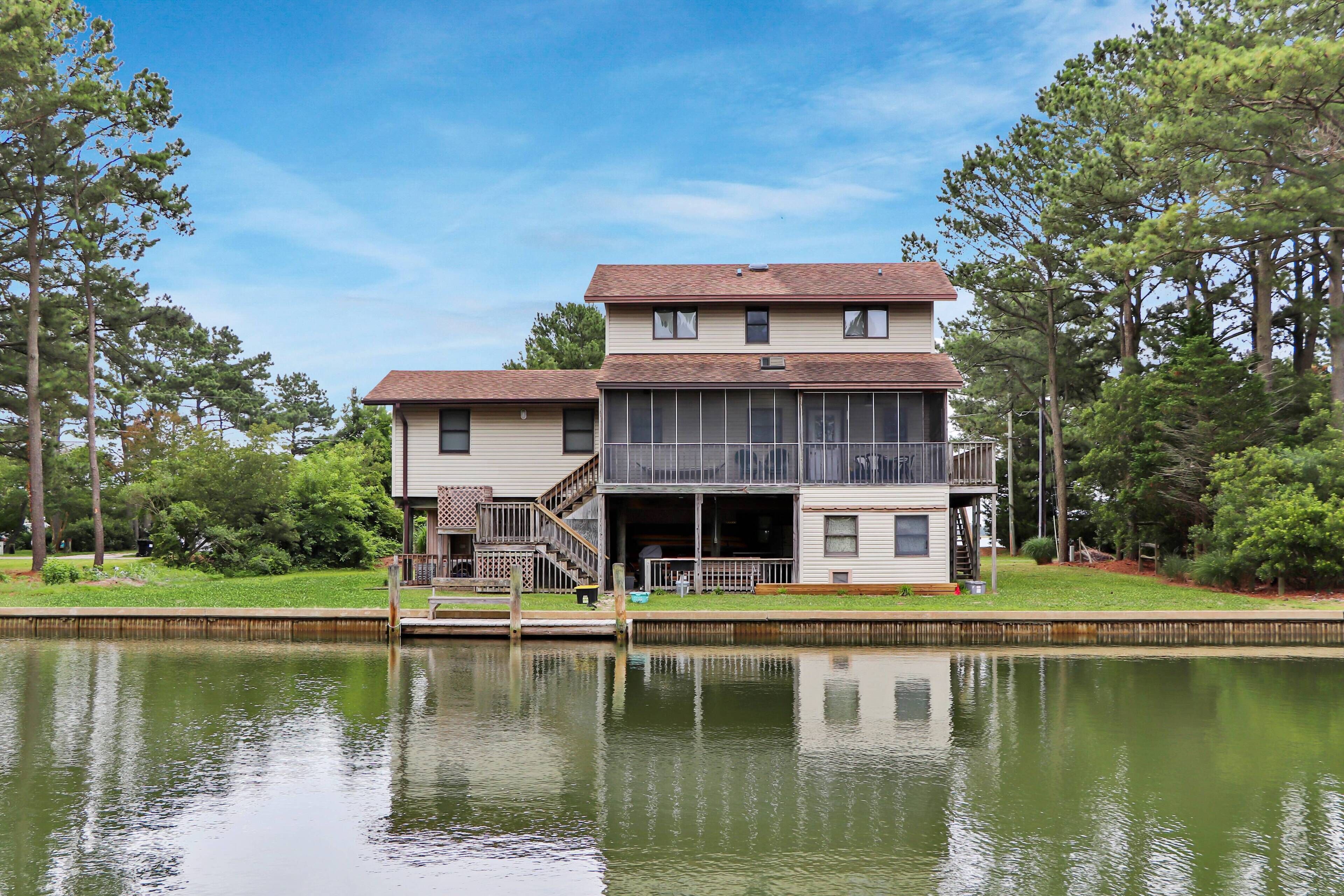 Coral Cove - fun waterfront home with floating dock and amazing patios