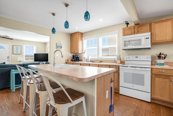 Fridge, microwave, oven, stovetop - Shell Cottage | East Side Assateague Channel Views w/ Decks, Outdoor Shower, Boat Parking & Pets (Chincoteague Island)