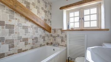 Combined shower/bathtub, hair dryer, towels, soap