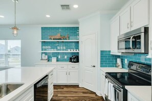 Fridge, microwave, oven, stovetop - Lollygaggin by the Beach! Fenced Yard, Outdoor Bar! (Galveston)