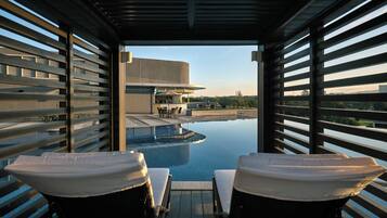 Outdoor pool, open 6:30 AM to 10:00 PM, free cabanas, sun loungers