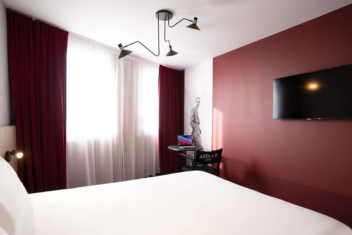 Desk, laptop workspace, blackout drapes, soundproofing