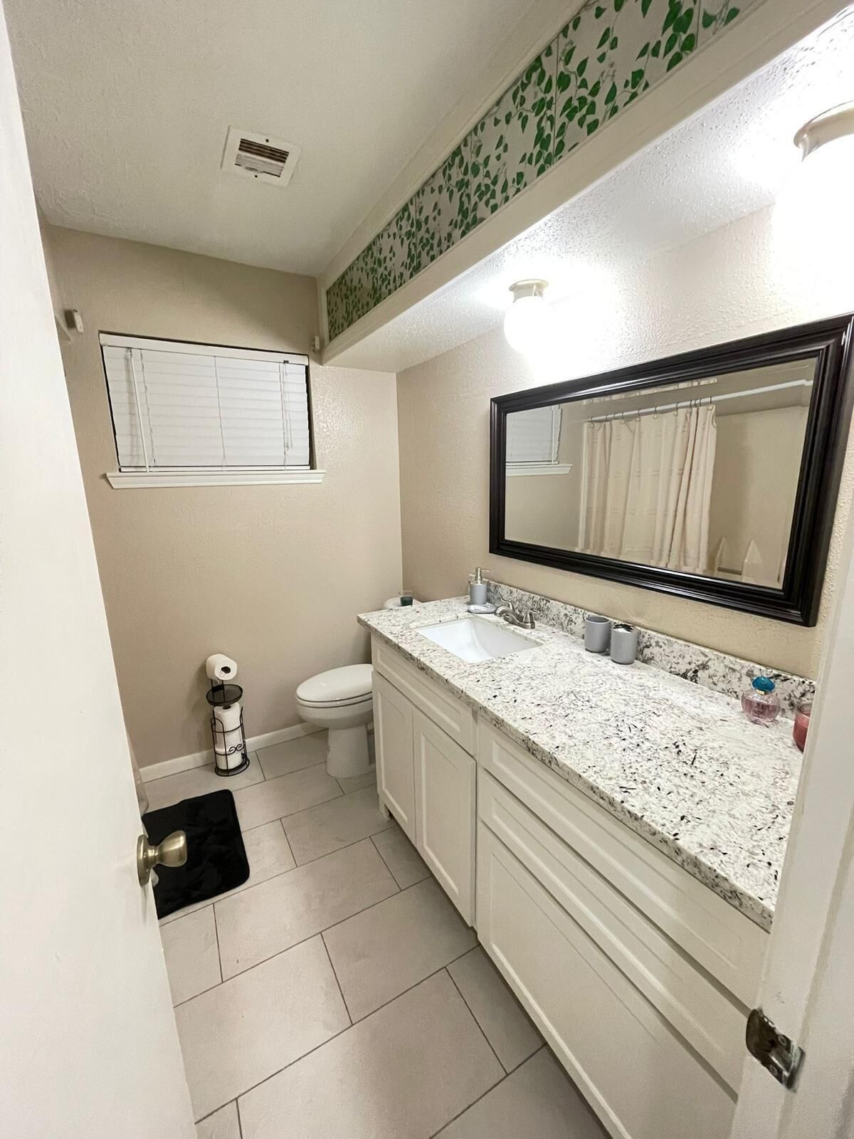 Combined shower/tub, hair dryer, towels, soap