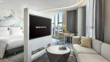 Standard Suite, 1 King Bed | Minibar, desk, laptop workspace, blackout drapes