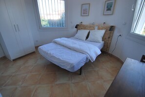 2 dormitorios, tabla de planchar con plancha, wifi y ropa de cama