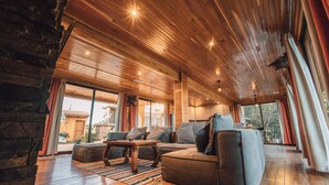 Panoramic Chalet, 3 Bedrooms, Fireplace, Mountain View | Living area - Cabañas Rancho Viejo (San Mateo Río Hondo)
