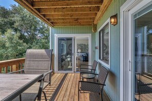 Outdoor dining - Beach Getaway Among the Oaks: Community Pools, Short Walk to Beach Access (Caswell Beach)