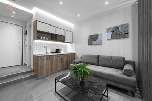 Estúdio conforto, vista para a cidade | Cozinha privada | Geladeira, micro-ondas, fogão, cooktop