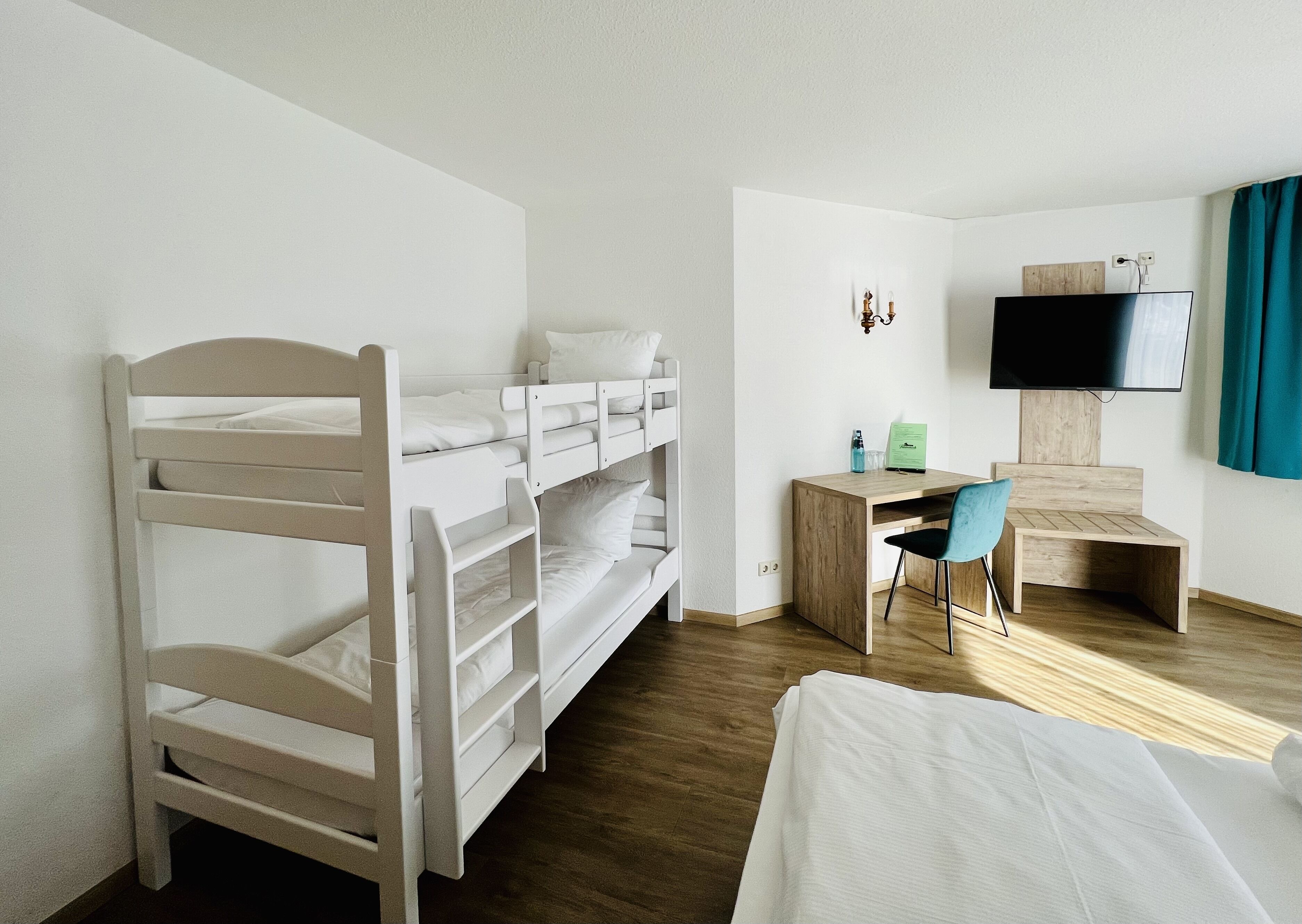 family quadruple room | hypo-allergenic bedding, desk, blackout curtains, iron/ironing board