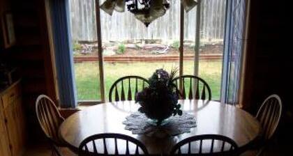 2 Story Log Home, on a Swan River near Mission Mountain Wilderness Views