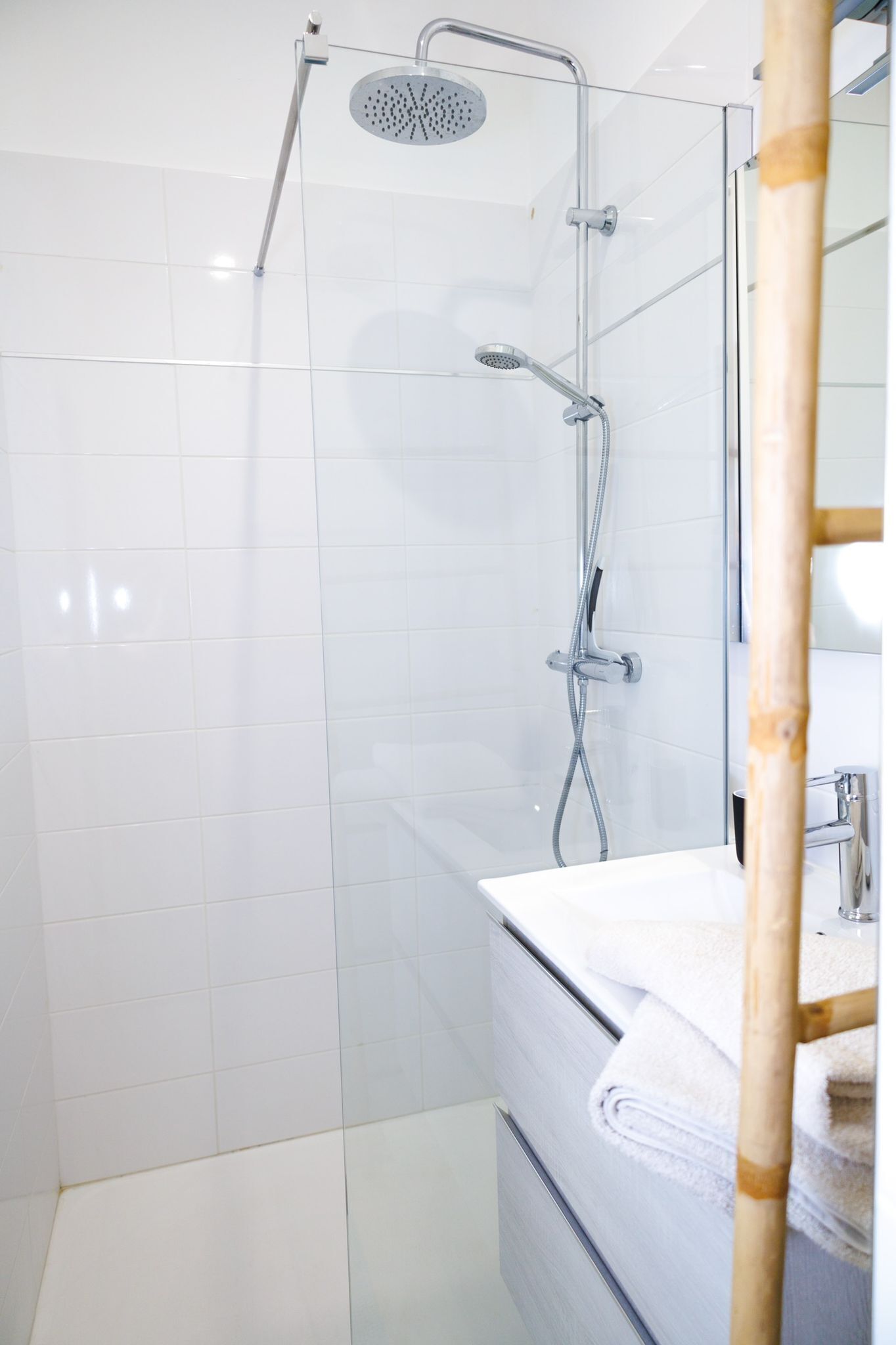 Shower, hair dryer, towels, toilet paper