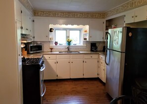 Fridge, microwave, oven, stovetop - Quaint & Cozy Guest House on Main St., park & walk downtown, Wi-Fi available. (Wellsboro)