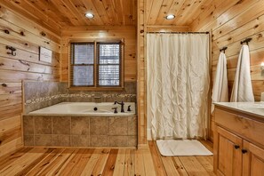 Shower, jetted tub, hair dryer, towels