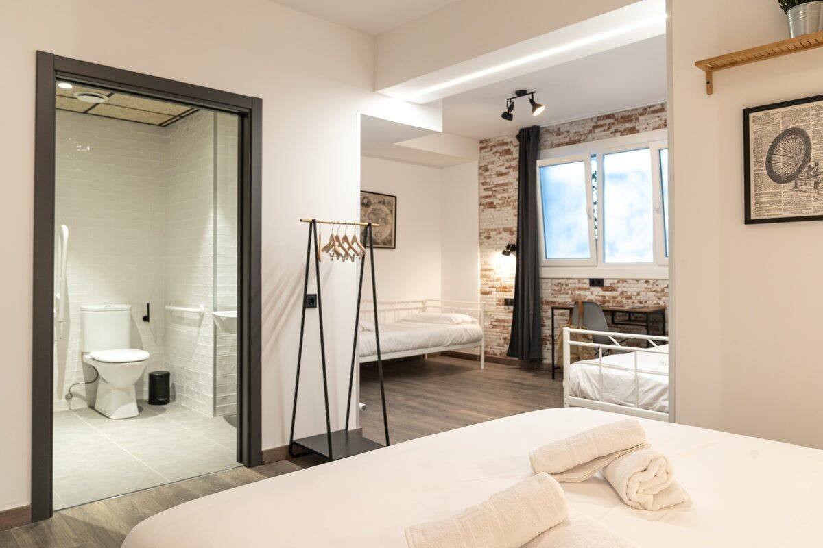 Family Quadruple Room, 6 Bedrooms | Desk, laptop workspace, free WiFi, bed sheets