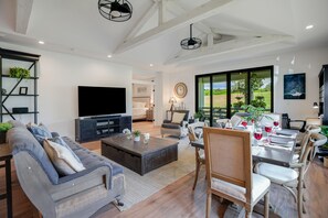 TV - Luxe retreat with hot tub and pool access, private W/D, grill, AC, & gas range (Koloa)