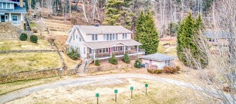 Dog-friendly home with updated kitchen, central AC, washer/dryer & large porch