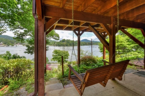 Lakefront home near Lake Junaluska with private balcony, lake views, shared pool
