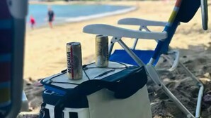 A beach chair with a can of beer and a bottle on it. - Gated condo, pool, high speed Wi-fi, washer & dryer. Walk to beach, near town  (Rincon)