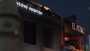A building with signage for 'Elatiko' and 'FJAVIERGIL' on the ground floor. - Gated condo, pool, high speed Wi-fi, washer & dryer. Walk to beach, near town  (Rincon)