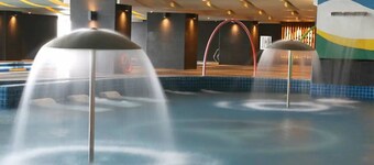 Penthouse Studio in the biggest Fitness & Family Complex - Fast Wifi/Netflix!