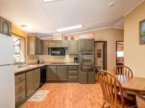 Full-sized fridge, microwave, oven, dishwasher