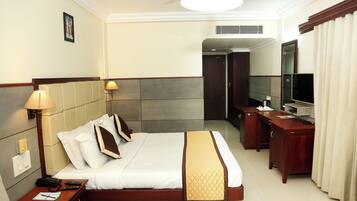 Deluxe Double Room, 1 Bedroom | Minibar, in-room safe, individually decorated, individually furnished